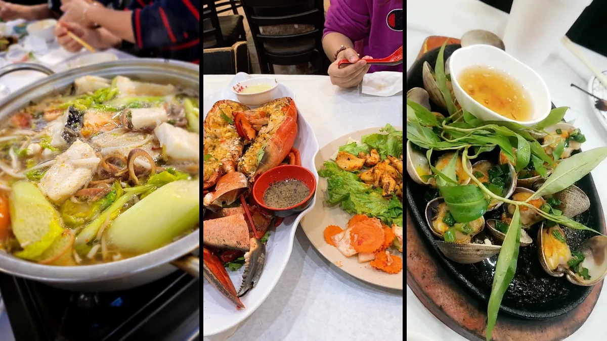 Seafood dishes on a busy restaurant table.